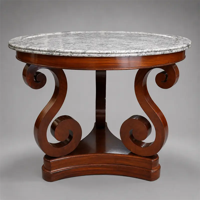 French mahogany marble top center table with scroll supports, 19th century.