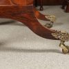 Rosewood side table brass casters