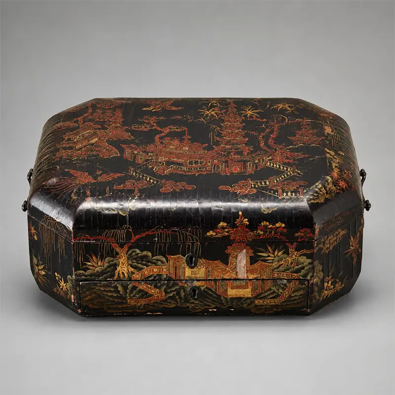 Chinese Export lacquer sewing box from Canton, China, circa 1840–1860, featuring hand-painted gilt and polychrome chinoiserie decoration on a black lacquer ground with a domed lid and fitted work box form.